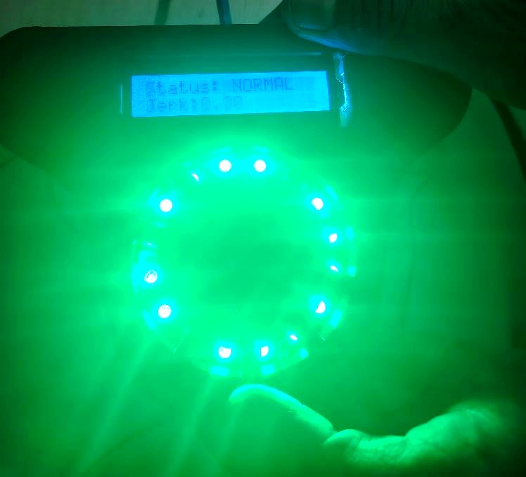 The device displaying a normal riding status, glowing green